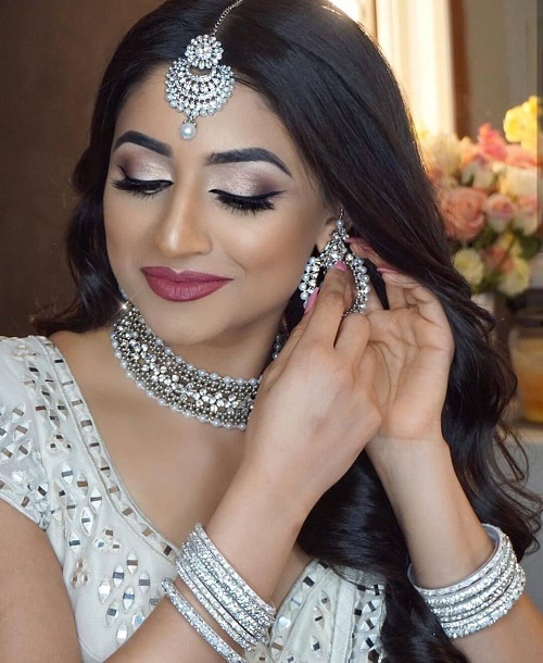 Silver makeup would go well with the white wedding dress